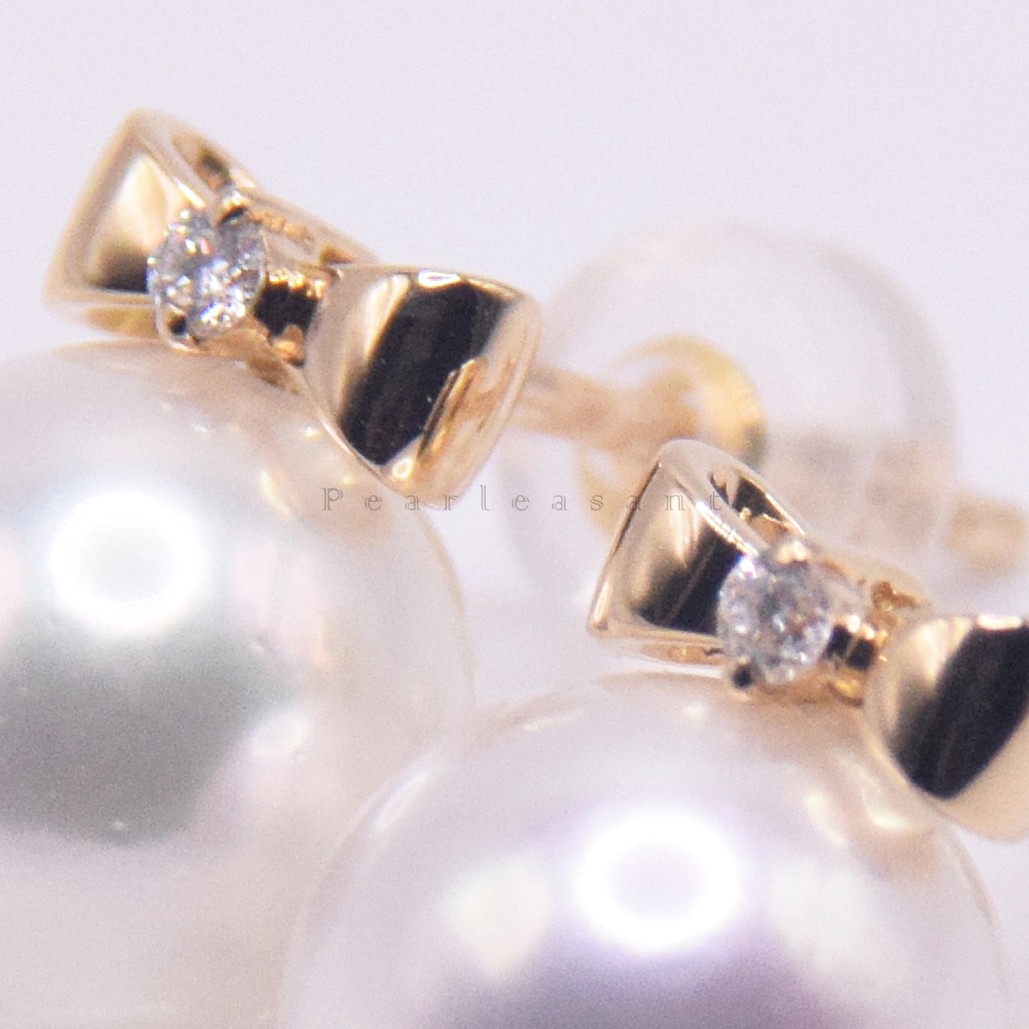 Hanadama Grade 7.5-8.0mm White Akoya Pearl Bowtie Earrings with Certificate