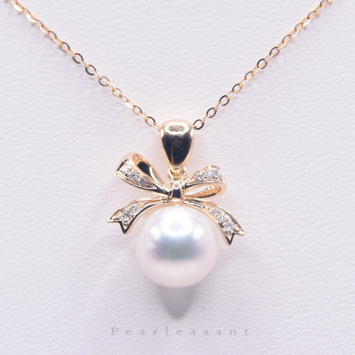 Hanadama Grade 8.5-9.0mm White Akoya Pearl Bowtie Pendant with Certificate