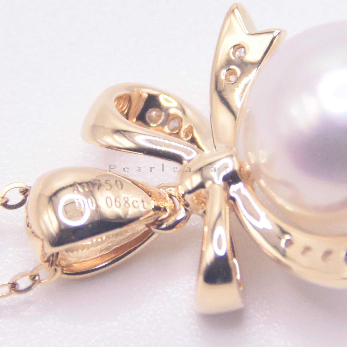 Hanadama Grade 8.5-9.0mm White Akoya Pearl Bowtie Pendant with Certificate