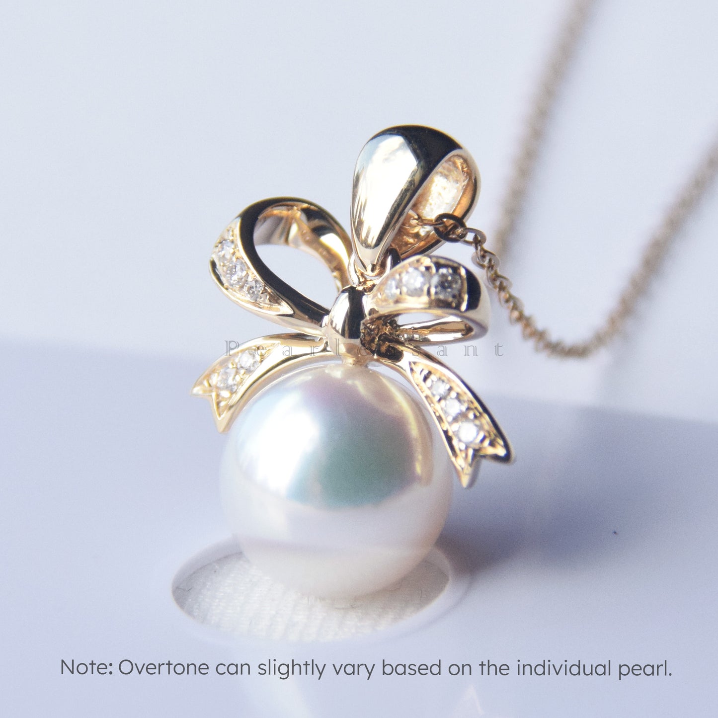 Hanadama Grade 8.5-9.0mm White Akoya Pearl Bowtie Pendant with Certificate